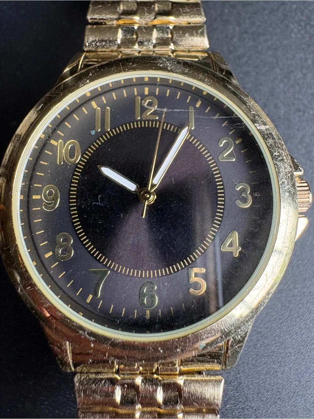 Gold Tone Watch with Black Dial